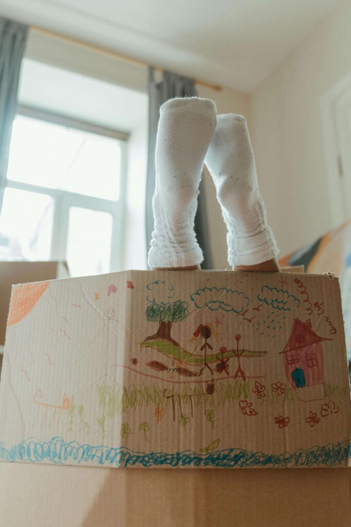 Make memories by playing in the unpacked boxes.