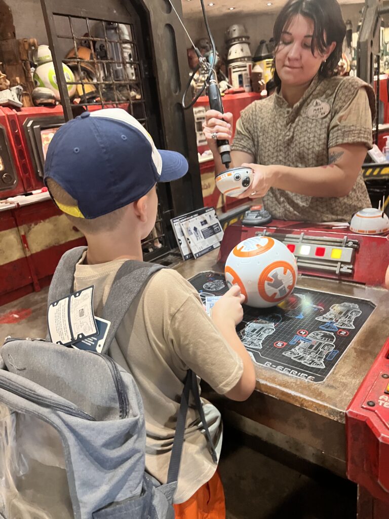 Each station had someone there helping to build the droid.